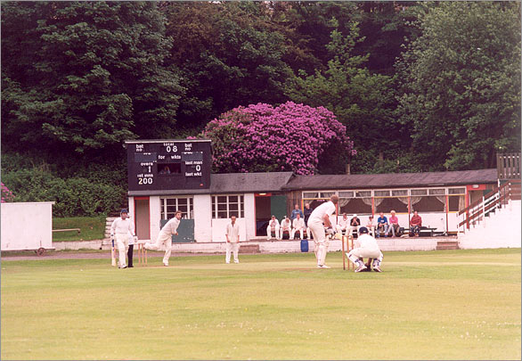 Linthwaite Cricket Club ground, pavilion and cricket match in Huddersfield